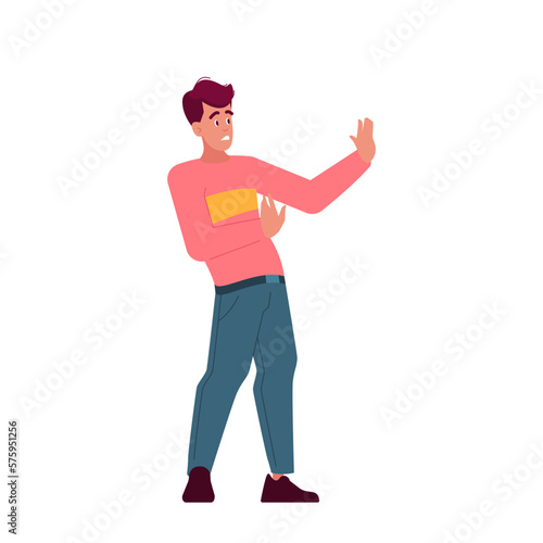 Man Standing Defensively With Stretched Arms, Ready For Confrontation. Protective Stance, Tense Facial Expression