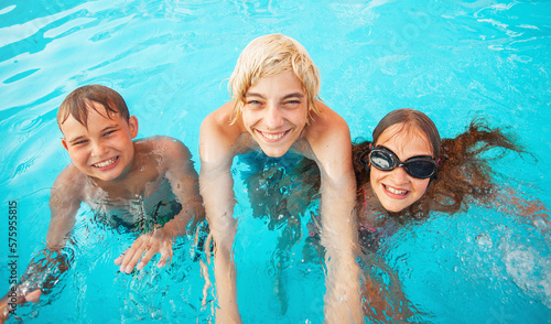 Children Having Fun In Outdoor Swimming Pool © Tatyana Gladskih