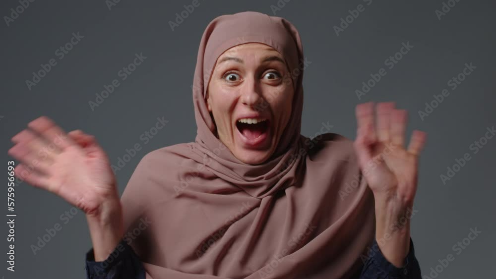 Wow face. Surprised woman in hijab Wow face. Surprised woman in hijab