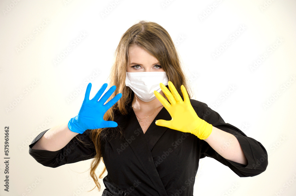 No war doctor holding hands with spread fingers yellow and blue color gloves confident look ukrainian woman in mask stop the war russian aggression ukraine will win victory of ukrainian people No war doctor holding hands with spread fingers yellow and blue color gloves confident look ukrainian woman in mask stop the war russian aggression ukraine will win victory of ukrainian people