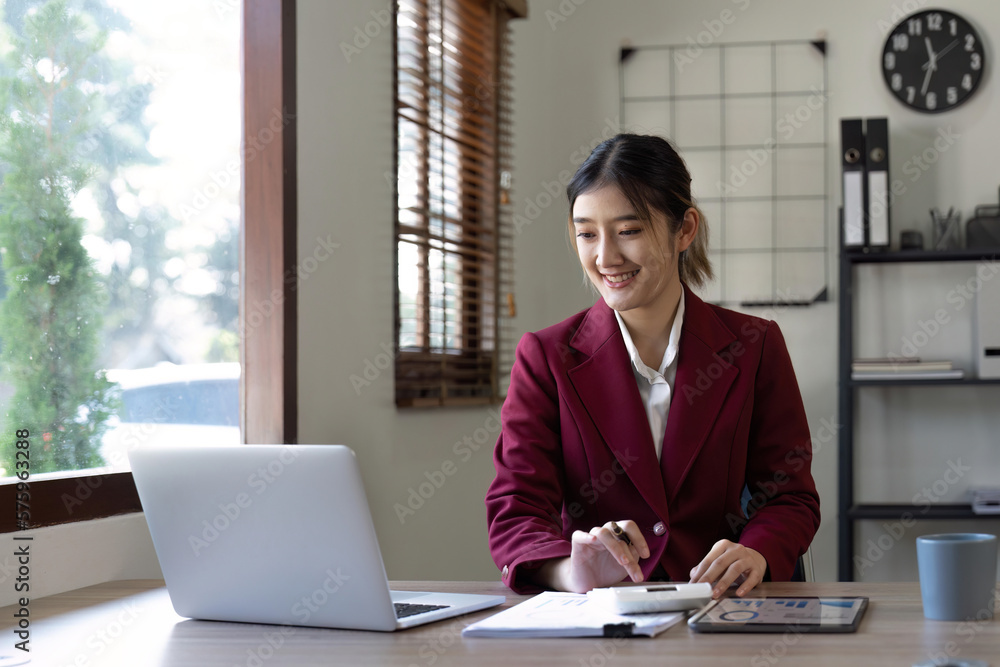 Businessman hands using text information on laptop to analyze financial statistical chart data and calculate cost of investment project Businessman hands using text information on laptop to analyze financial statistical chart data and calculate cost of investment project