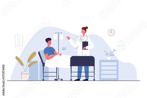 doctor standing with patient on the bed.
