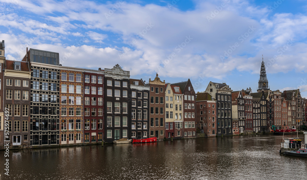 Panoramic of a typical canal in Amsterdam in Holland in the Netherlands