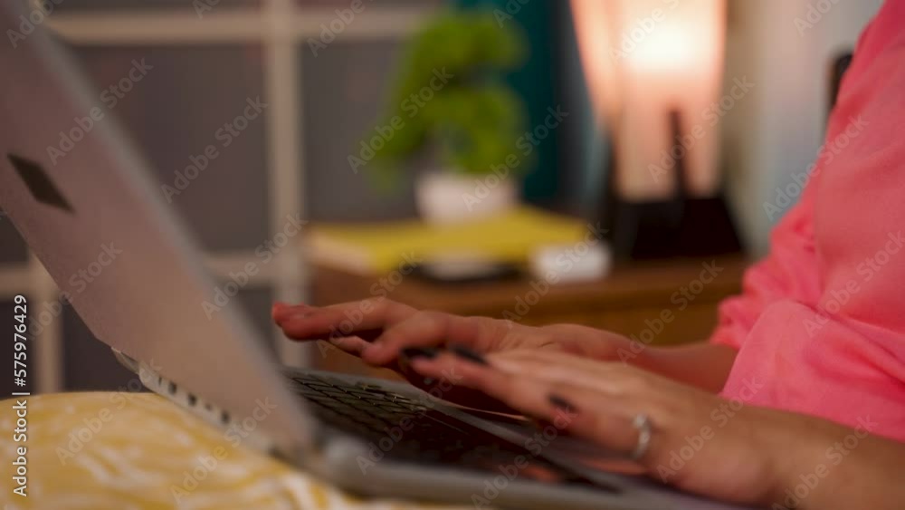 Close up shot of girl using or working on laptop during late night at home - concept of overworking, research and surfing internet. Close up shot of girl using or working on laptop during late night at home - concept of overworking, research and surfing internet.