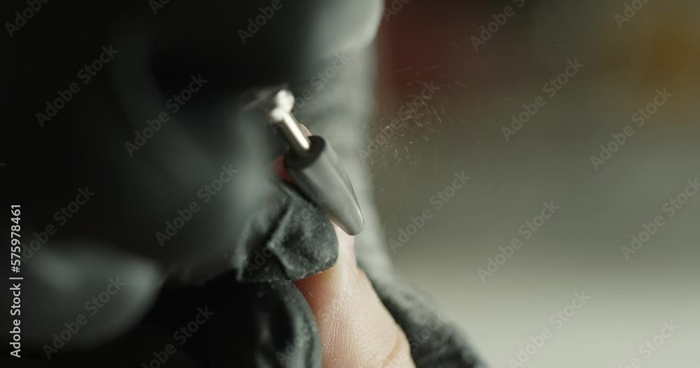 cleaning nails using a manicure cutter. macro. close-up vertical video cleaning nails using a manicure cutter. macro. close-up vertical video