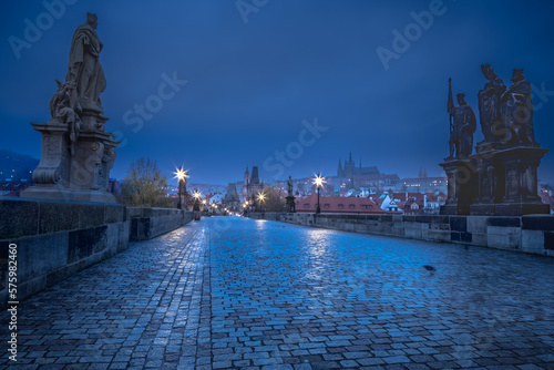 Obraz na płótnie Charles Bridge, Prague at dramatic evening, Czech Republic, with night lighting w salonie