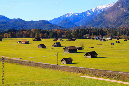 Obraz na płótnie Bavarian alps and farm barns from above, Garmisch, Zugspitze, Bavaria, Germany w salonie