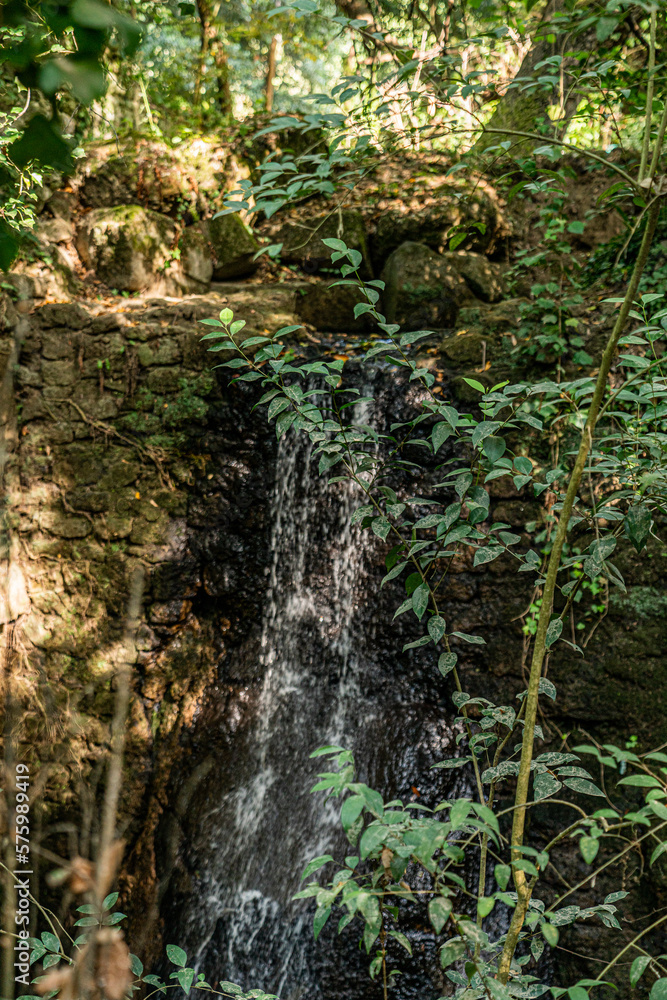 waterfall in the forest of bomarzo waterfall in the forest of bomarzo