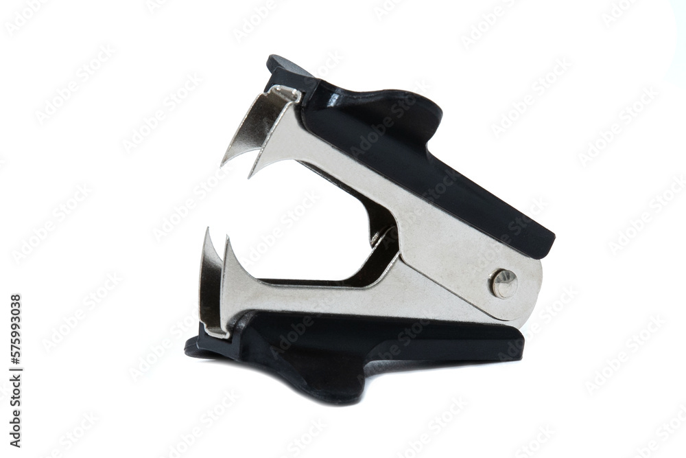 Anti-stepler black isolated on a white background for stitching documents Anti-stepler black isolated on a white background for stitching documents
