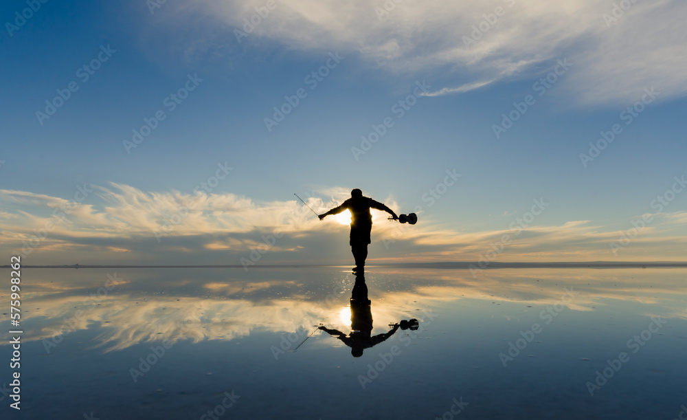 silhouette of a person on a sunset