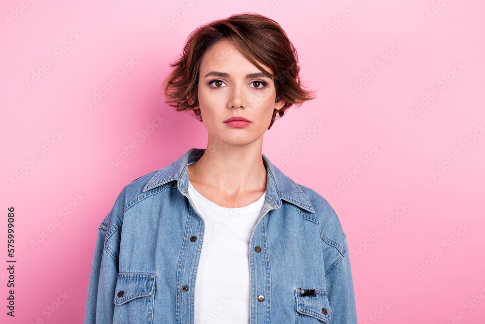 Fototapeta premium Photo portrait of confident attractive woman bob brown hairstyle wear retro denim jacket stylish white t-shirt isolated on pink color background