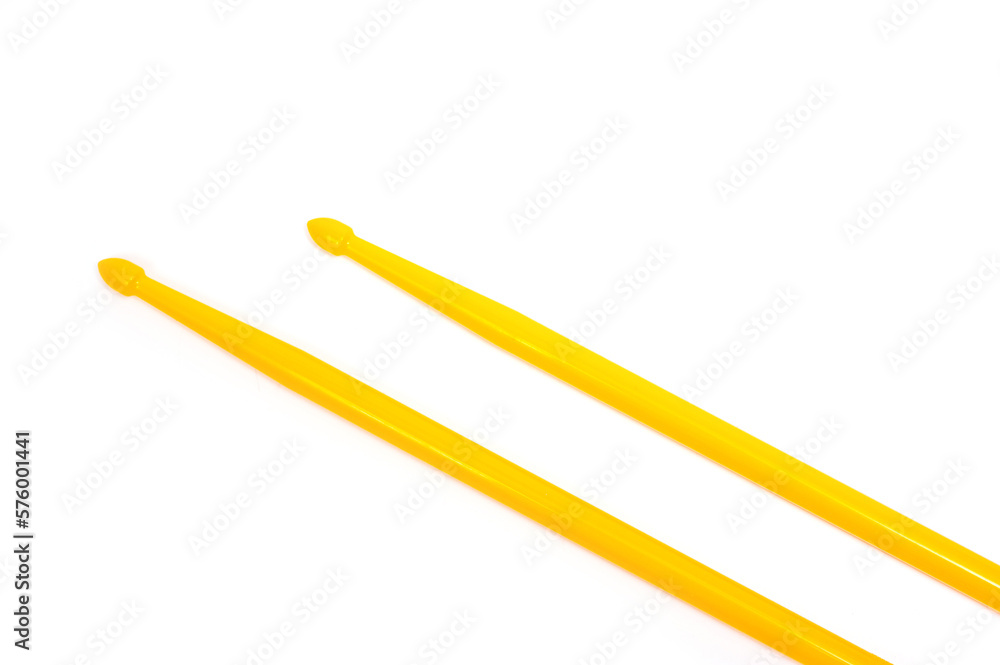 Set of drum sticks professional yellow nylon for playing percussion instruments. Set of drum sticks professional yellow nylon for playing percussion instruments.