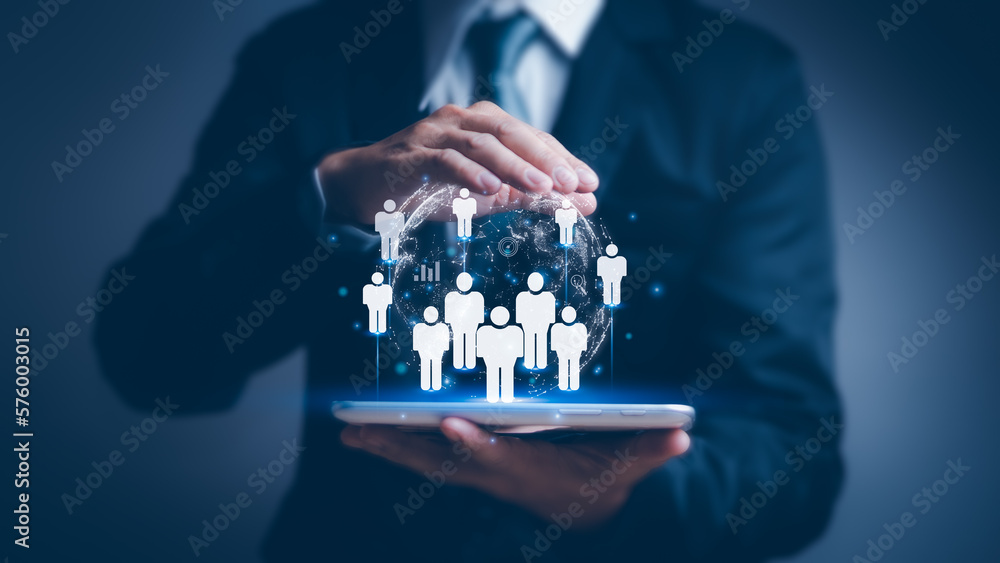Naklejka premium concept of customer relationship management business network structure Customer service, businessman showing person icon and globe on tablet Represents the marketing strategy of organization business