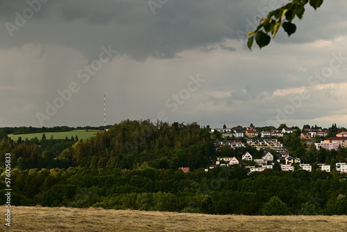 Overname Nature Running Storm with Rain over the town of Tachov photo