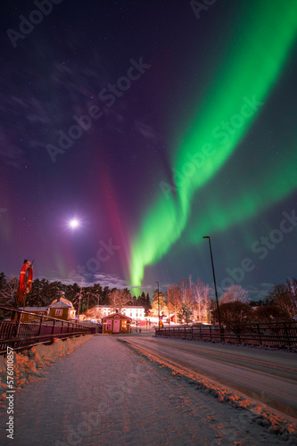 Northern lights over a small town. Nykarleby/Uusikaarlepyy, Finland