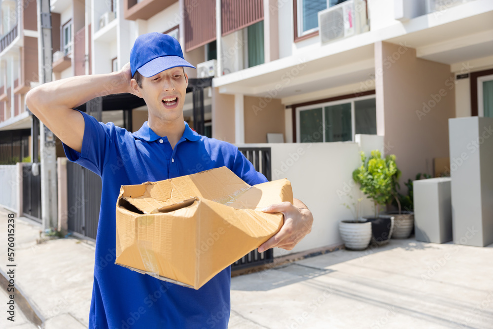 Delivery Man with Damaged Parcel Box Delivered to Customer Delivery Man with Damaged Parcel Box Delivered to Customer