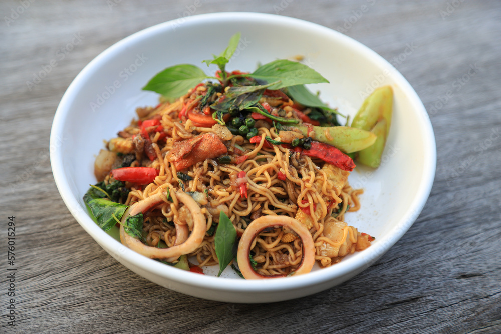 Stir-fried squid with basil and chilli for eating in meal of living life