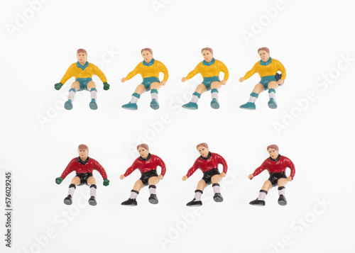 plastic toy soccer players isolated on white background