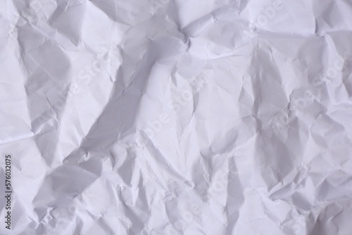 Sheet of crumpled paper white as background  top view