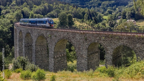 A train on the high old viaduct near Novina, Czech republic