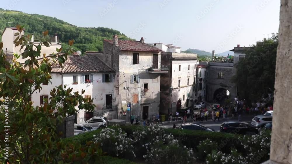 Wedding Day, catering and food. panoramic view of an ancient village in italy. people along the way await the arrival of the bride Wedding Day, catering and food. panoramic view of an ancient village in italy. people along the way await the arrival of the bride