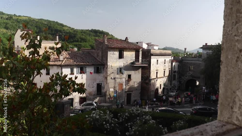 Wedding Day, catering and food. A panoramic view of an ancient village in italy. people along the way await the arrival of the bride Wedding Day, catering and food. A panoramic view of an ancient village in italy. people along the way await the arrival of the bride