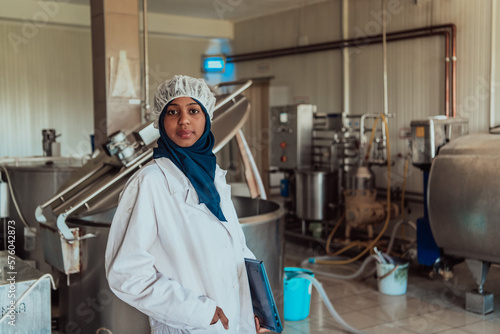  Arab business partner visiting a cheese factory. The concept of investing in small businesses
