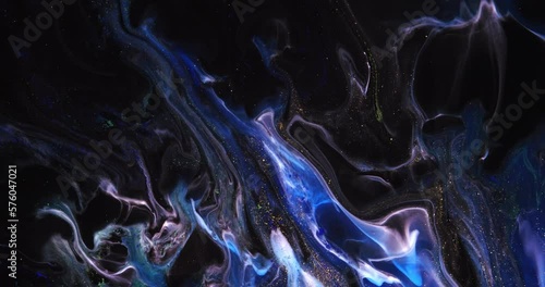 Ink space. Abstract Colorful Ink Spread Art. There are divergent blue and white colors on a black background.