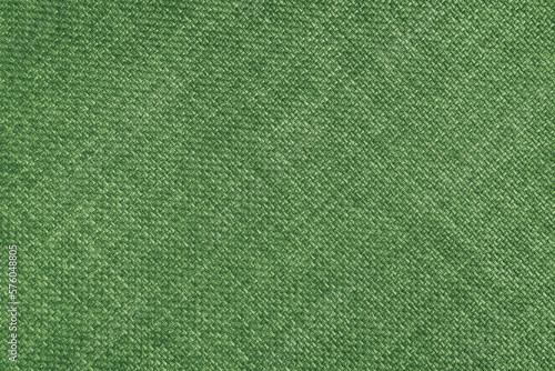 Jacquard woven upholstery, light green coarse fabric texture with diagonal weave lines. Textile background, furniture textile material, wallpaper, backdrop. Cloth structure close up.