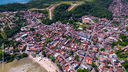 Aerial view of Itacare beach, Bahia, Brazil. Village with fishing boats and vegetation