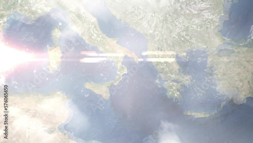 Earth zoom in from outer space to city. Zooming on Crotone, Italy. The animation continues by zoom out through clouds and atmosphere into space. Images from NASA