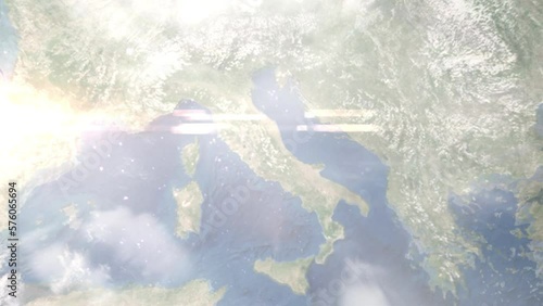 Earth zoom in from outer space to city. Zooming on LAquila, Italy. The animation continues by zoom out through clouds and atmosphere into space. Images from NASA photo