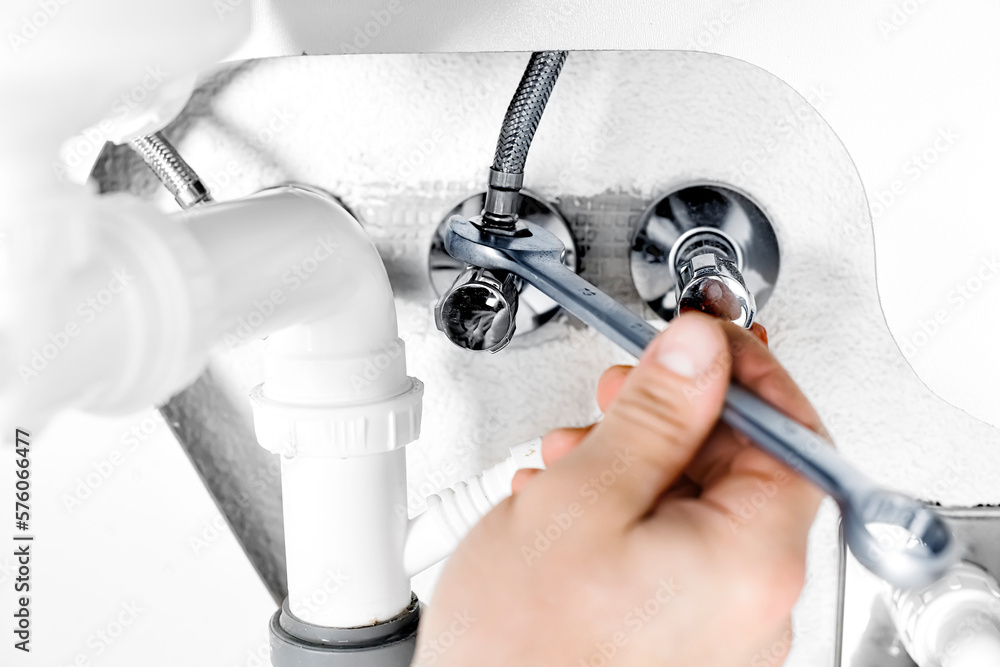Detail of Plumber fixing leaking Sink Detail of Plumber fixing leaking Sink