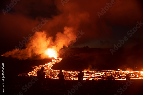 Volcanic eruption landscape at night spectators, Iceland © Arctic Mystic