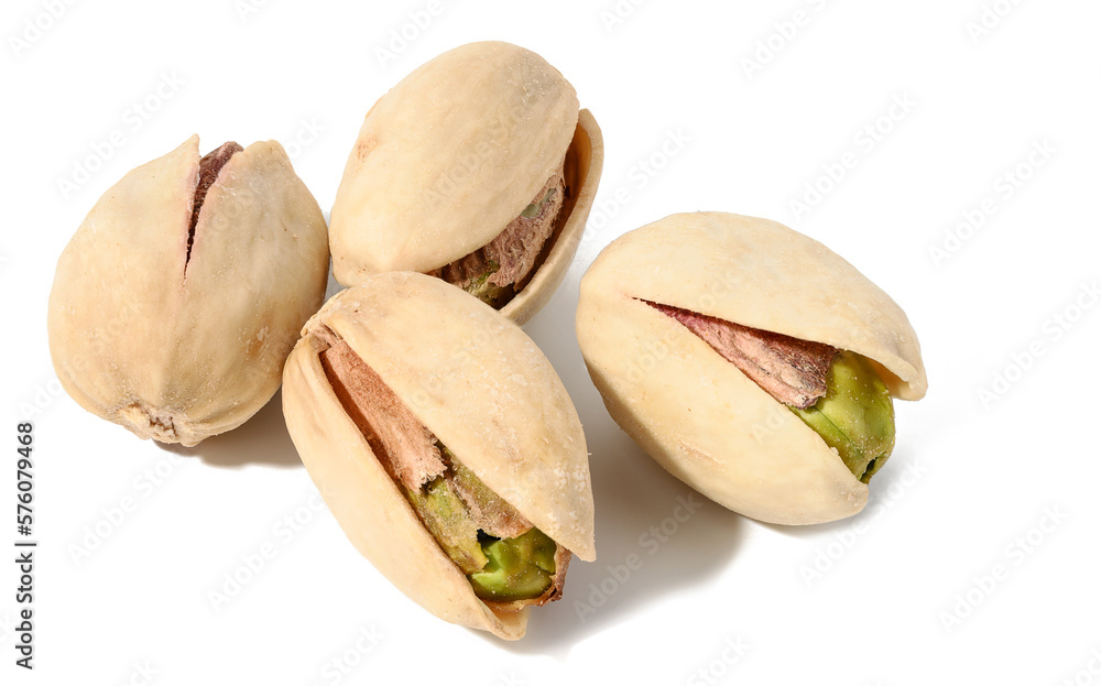 Fried salted pistachios in shell on white isolated background, delicious snack Fried salted pistachios in shell on white isolated background, delicious snack
