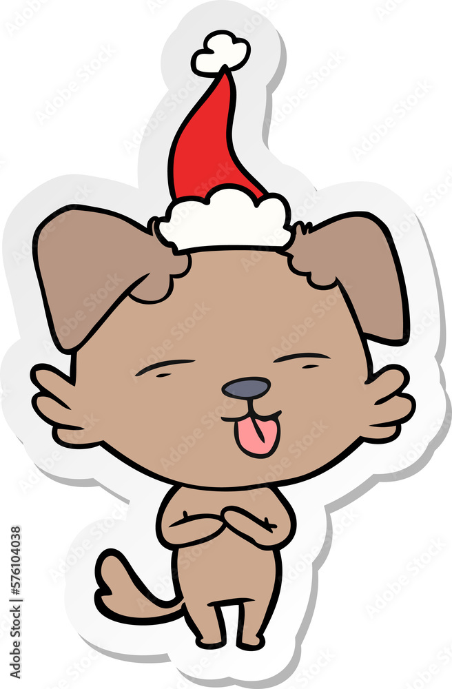sticker cartoon of a dog sticking out tongue wearing santa hat