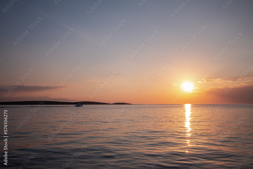 Calm seascape during picturesque sunset