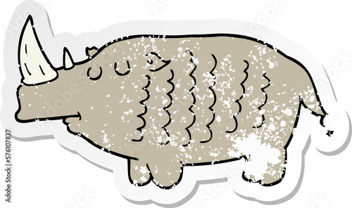 distressed sticker of a cartoon rhinoceros photo