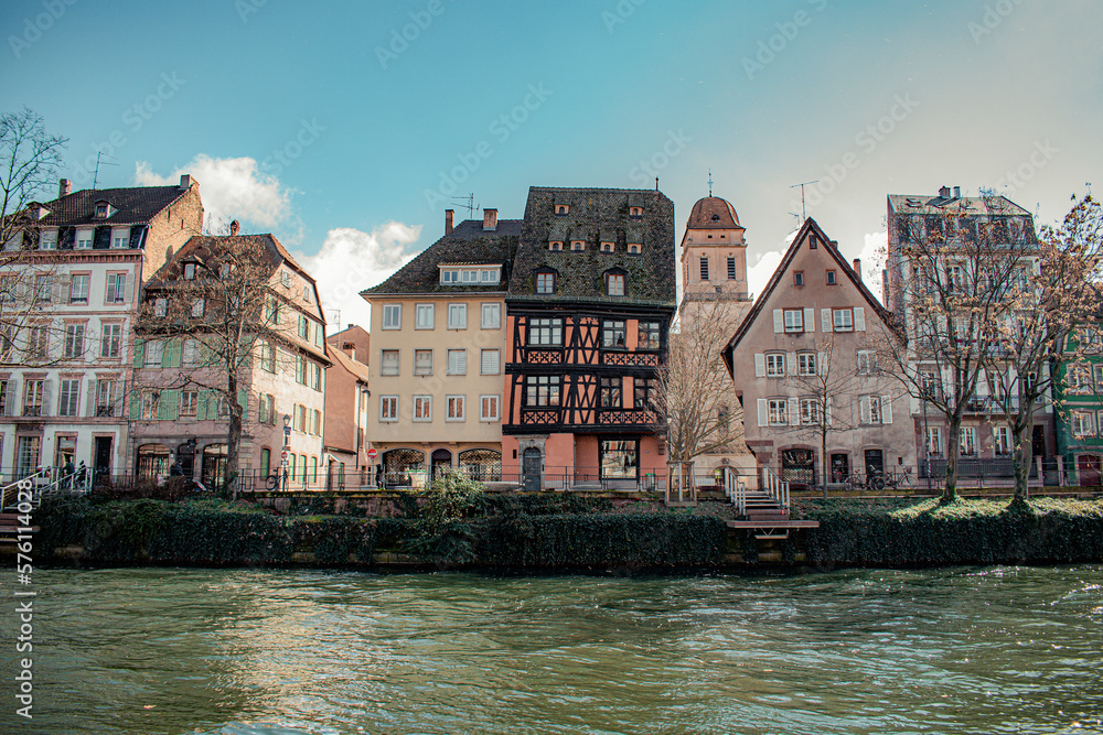 town river with old buildings