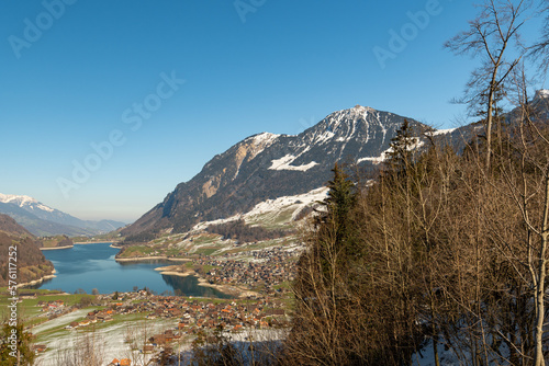 Lake of Lungerersee surrounded with a fantastic mountain panorama in Lungern in Switzerland photo