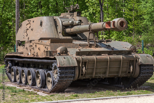 View of an old abandoned rusty soviet self-propelled howitzer 2S3 Akatsiya standing outdoors in Ukraine