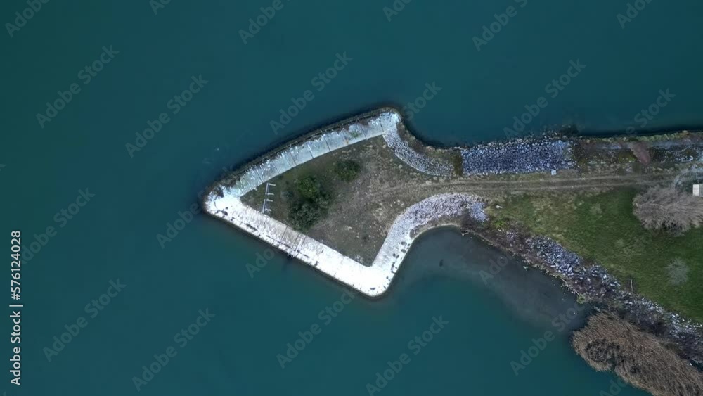 A place where a river divides into two smaller ones. An artificially