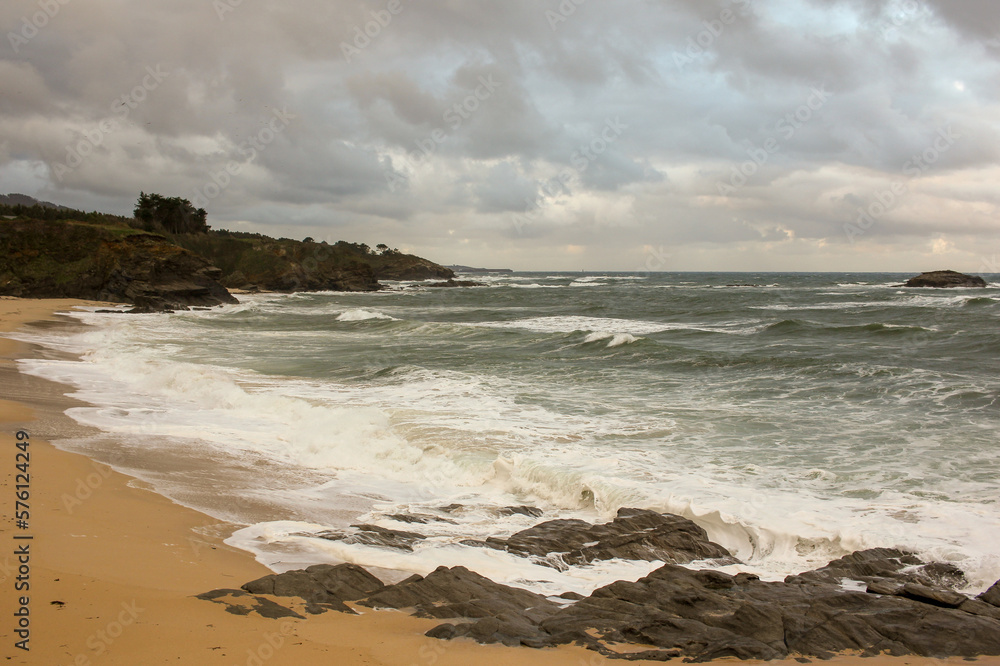cloudy sky and waves in the Cantabrian coast cloudy sky and waves in the Cantabrian coast