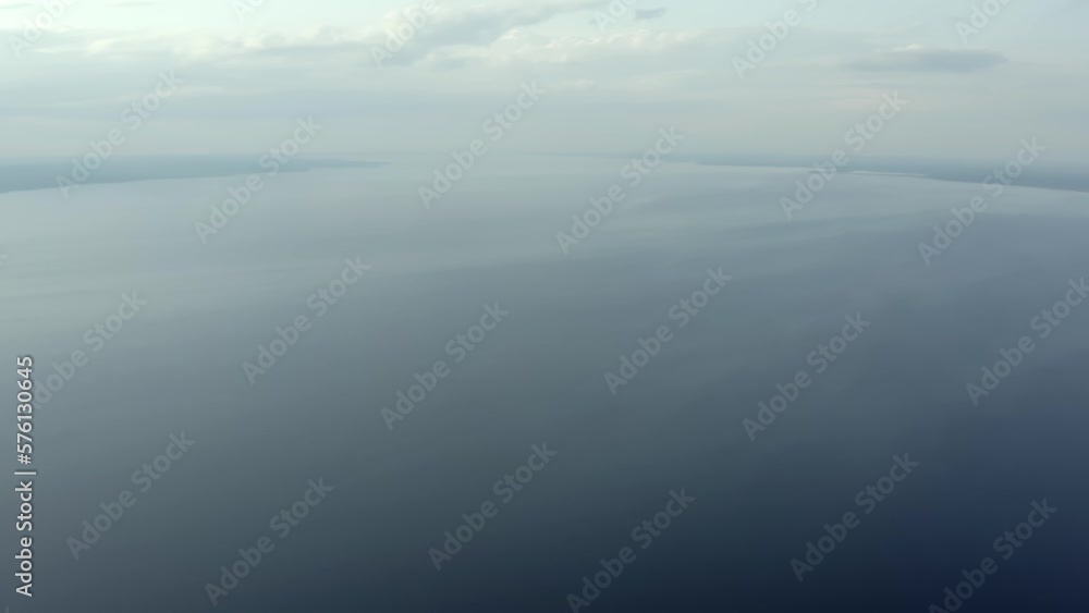 Calm water surface during beautiful orange sunset. Calm water surface during beautiful orange sunset.