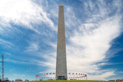 The George Washington Monument against the blue sky in the capital of America. photo