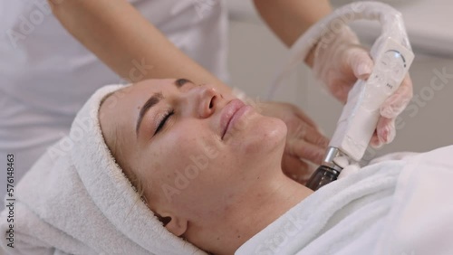 Skin rejuvenation, Deep tissue, Blood circulation. Following massage procedures in salon vacuum-vacuum body massages, problem areas slimming, body care professional equipment, lpg massage procedure photo