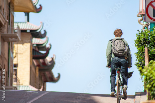 Fototapeta Naklejka Na Ścianę i Meble -  person riding a bike