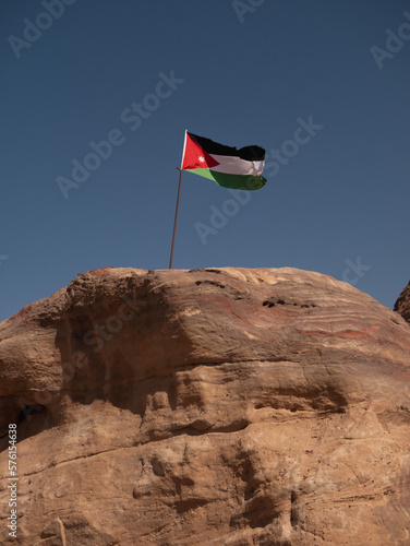 Jordan flag waving in the wind in Petra. 
