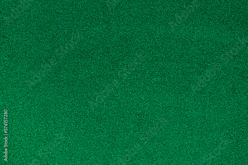 Dark green glitter background. Green 
 texture.