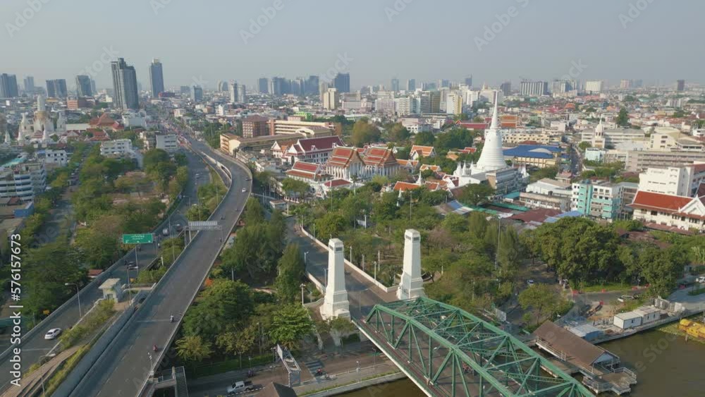 Aerial view morning sunrise buddhist temple riverside with road in Bangkok Thailand Aerial view morning sunrise buddhist temple riverside with road in Bangkok Thailand